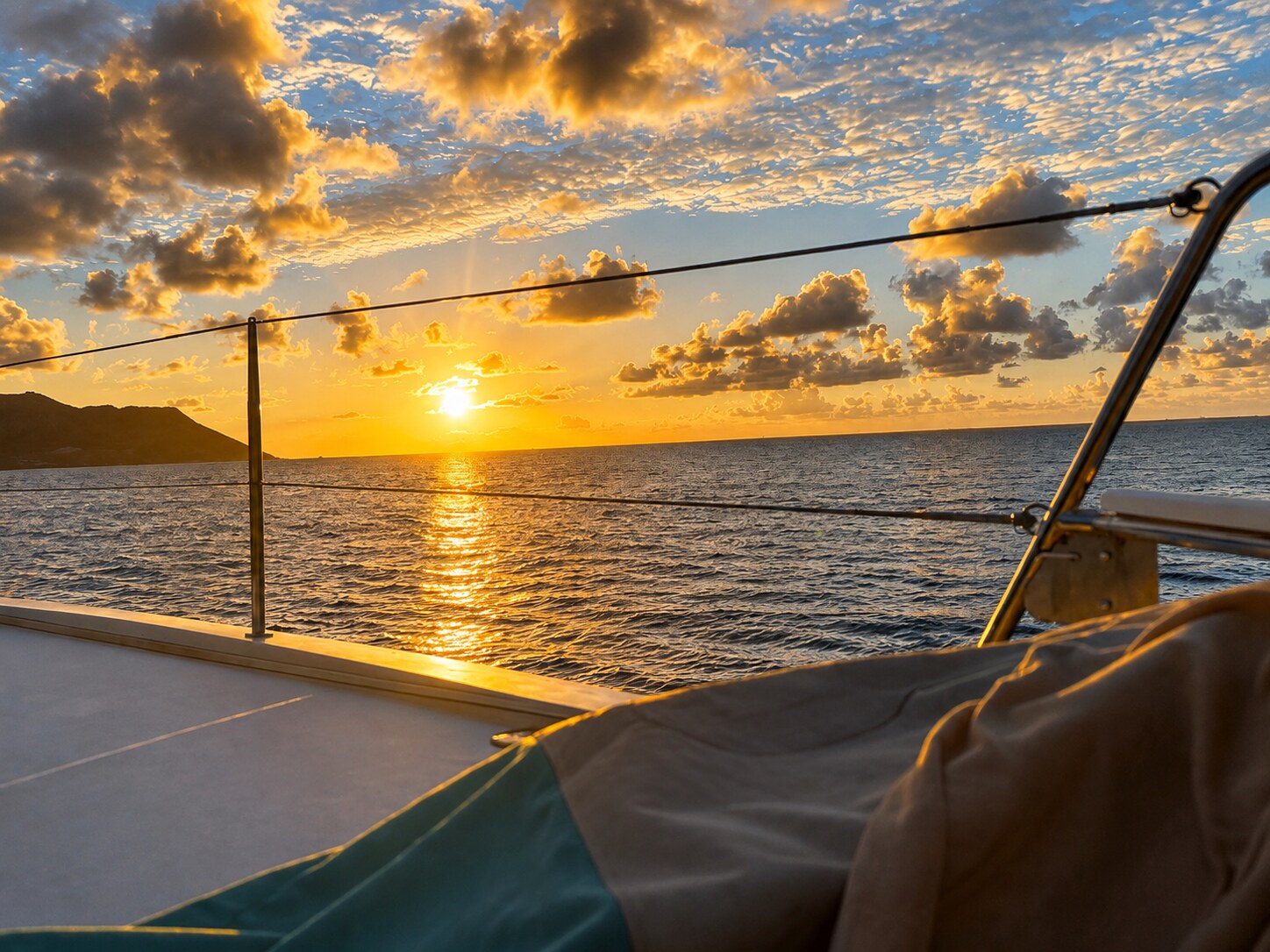 The sun setting over Grand-Case Bay, from Zephyr's deck