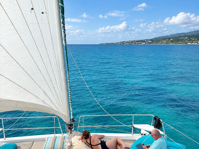 Zephyr under sail along the coast, the two of you aboard