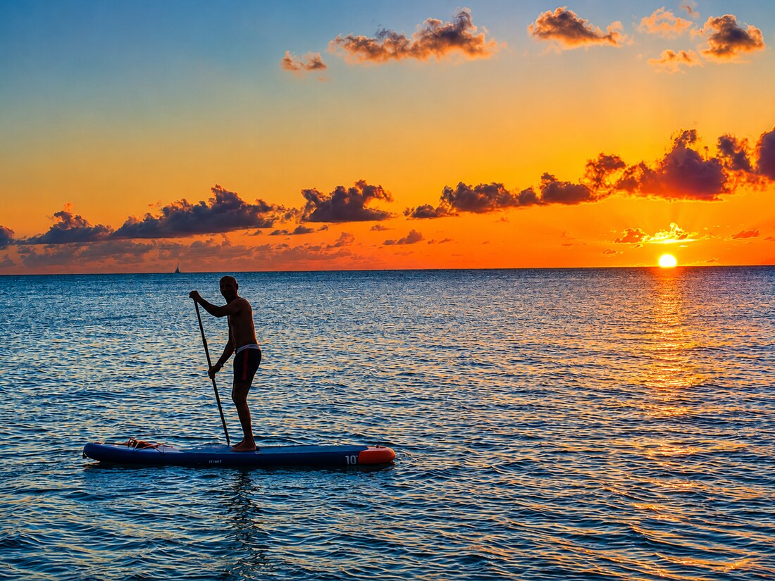 Paddleboarding at sunset, from the anchorage