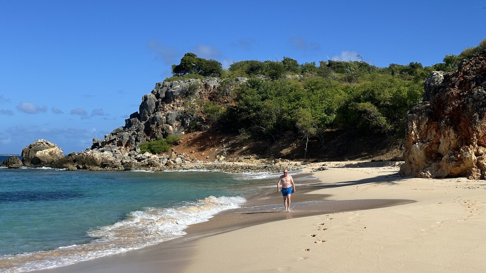 Tintamarre beach and its rocky point, seen from the anchorage