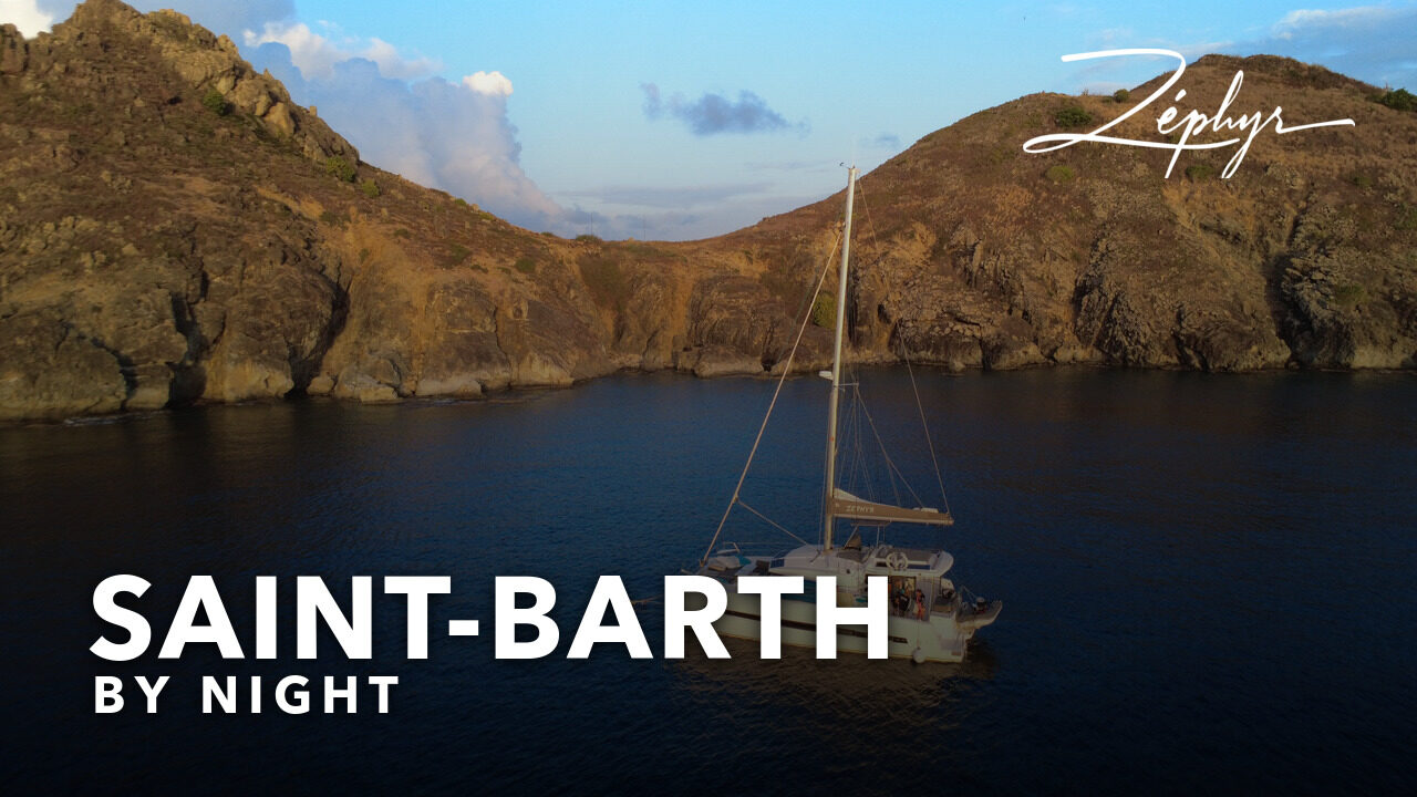 Zéphyr at anchor in a Saint-Barthélemy cove, late in the day